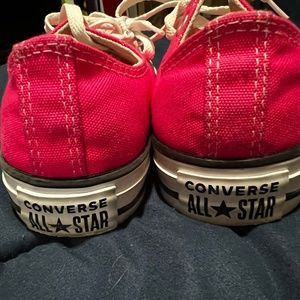 Women’s size 6 men’s size 4 hot pink converse shoes gently used